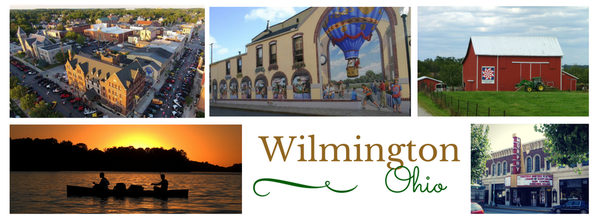 sky image of Wilmington College, building with hot air balloon, red barn, boat on river at sunset, Wilmington OH logo, movie theatre